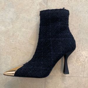 Zara black booties with gold toe.